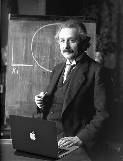 Albert Einstein using MacBook